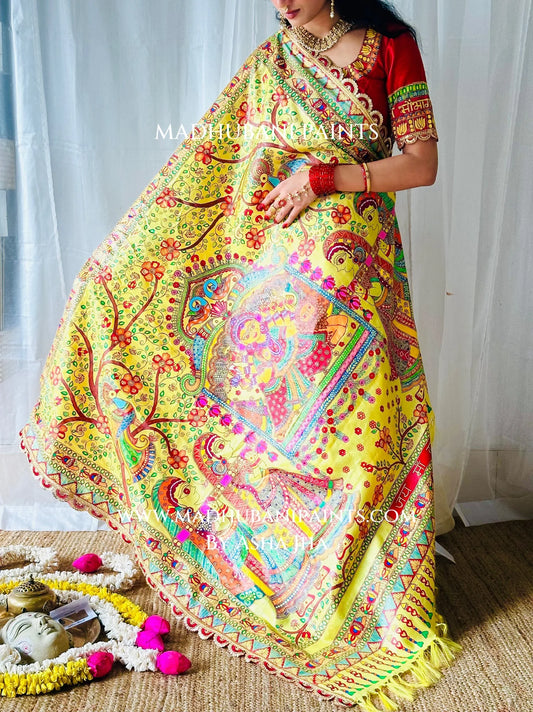 Wide view of Devi Ki Sawari Madhubani saree pallu with hand-painted Goddess Durga in a doli, floral branches and lotus borders.
