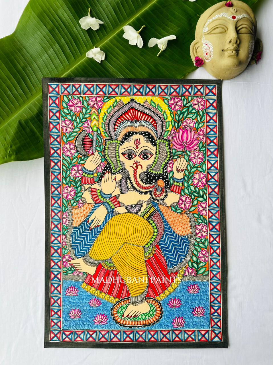 A colorful Madhubani painting of Lord Ganesha on a canvas