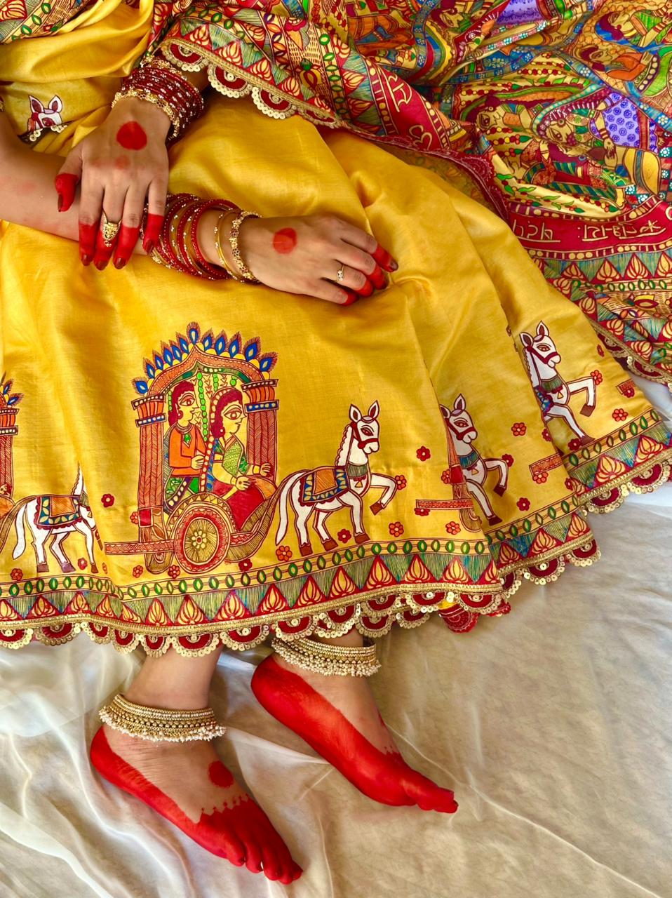 Vidaai scene painted on a madhubani painting bridal saree