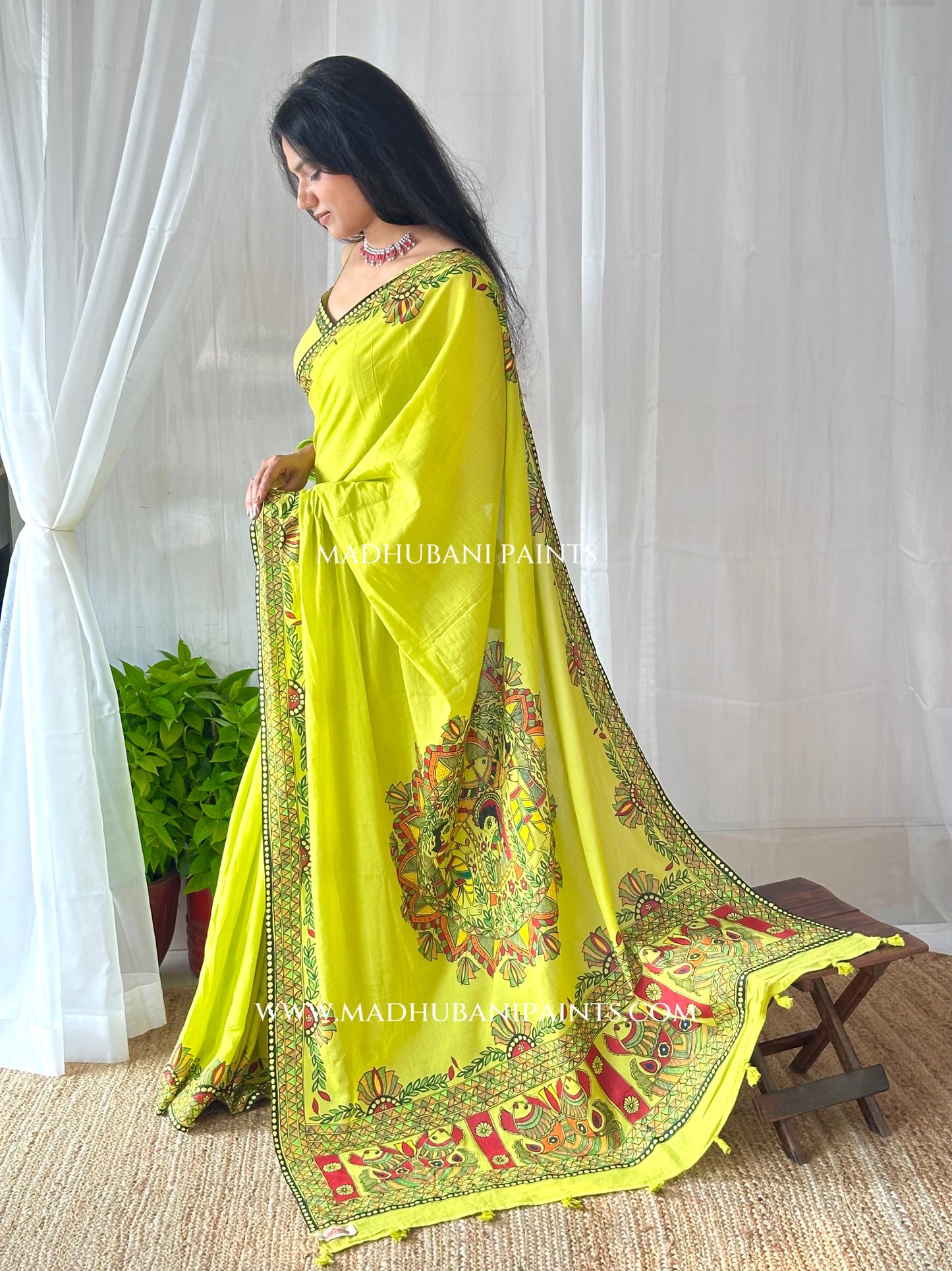 Green cotton saree with matching blouse piece with hand-painted Madhubani kamal (lotus) motifs  Hara Shringar