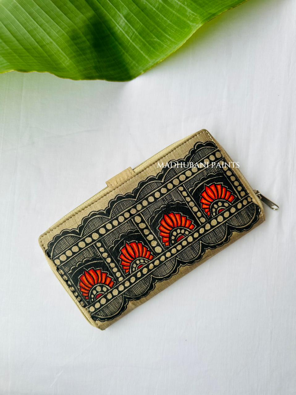 Hand-painted Madhubani clutch in turquoise with a bold square pattern  lotus