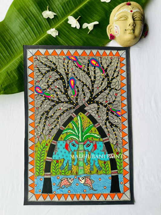 A Madhubani painting featuring two elephants under a tree, styled on a white surface with a green banana tree over a fish pond