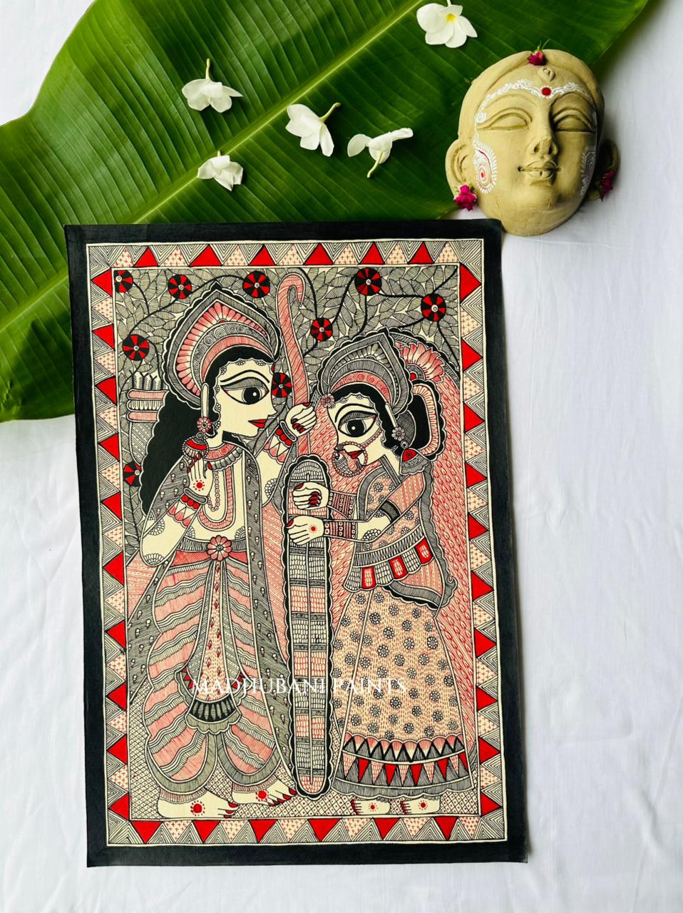 A framed Madubani style folk art depicting Ram sita Varmala, painted on a white background in red and black combination