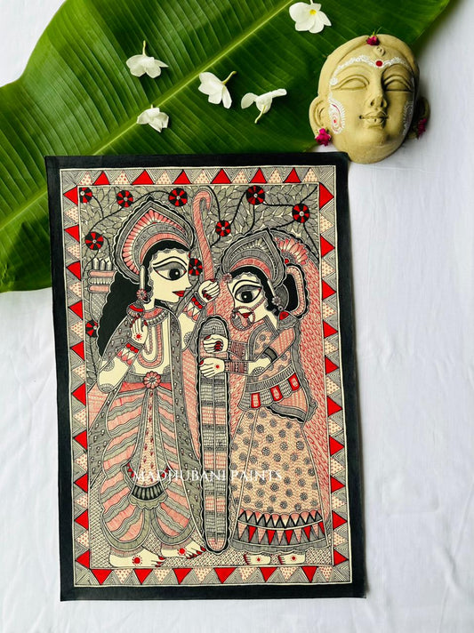 A framed Madubani style folk art depicting Ram sita Varmala, painted on a white background in red and black combination