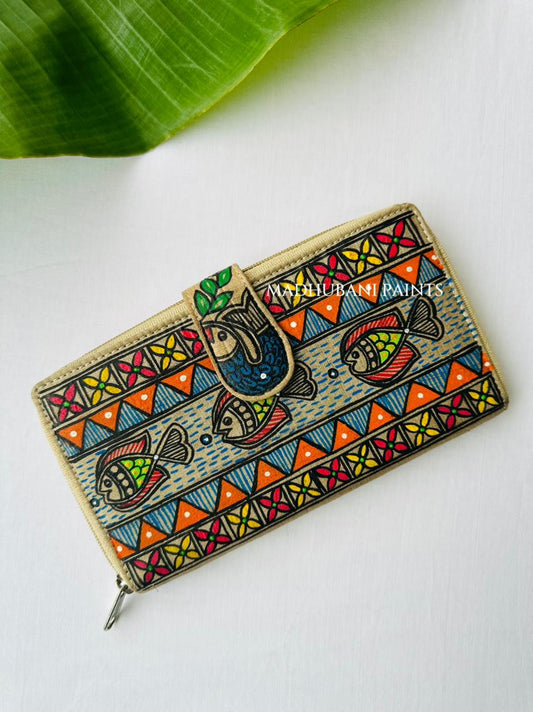 Hand-painted Madhubani clutch in fish swimming in waves , painted water bubbles, and a orange triangle and floral border along the base