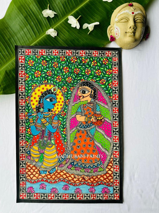 A colorful Madhubani hand-painted folk art print depicting Lord Krishna and Radha