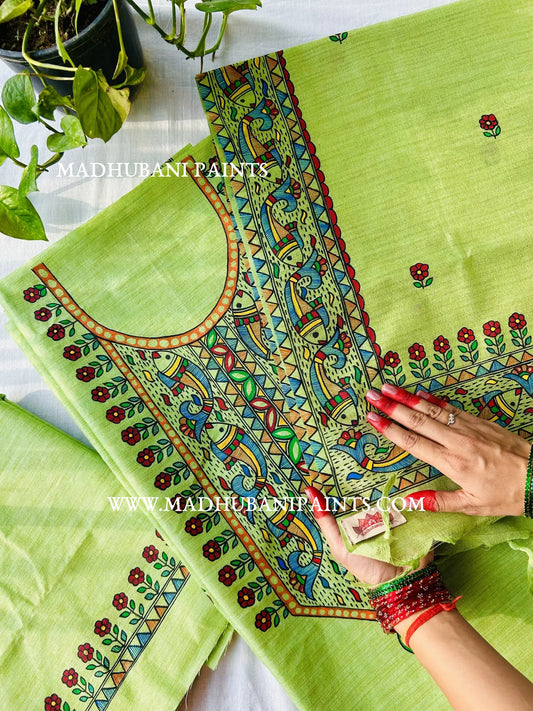 Green handloom cotton kurta with colorful Madhubani fish and horse artwork painted on the chest, inspired by Mithila traditions.