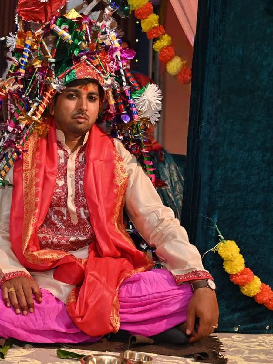 Traditional beige Madhubani wedding kurta for men, featuring hand-painted red and maroon artwork inspired by Mithila's cultural heritage