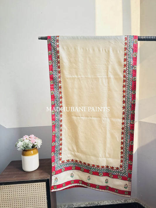 Beige silk stole featuring colorful hand-painted flower motifs and intricate Madhubani-style borders, handcrafted in traditional Mithila painting art.