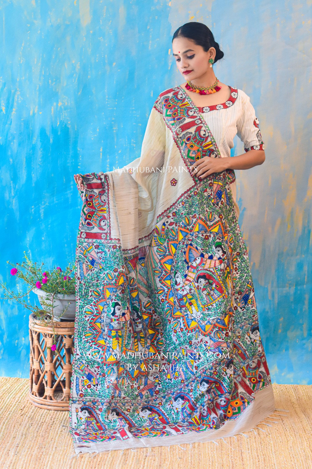 Cream Colorful Madhubani designer catalog saree, bavanji border, and pallu features Madhubani print