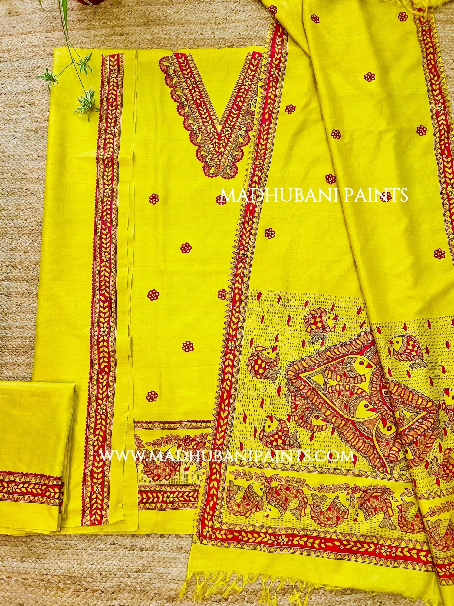Yellow Madhubani kurta with intricate red hand-painted fish designs and decorative neckline, ideal for wedding functions.