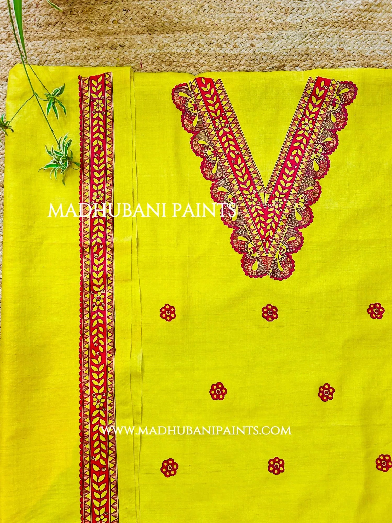 Yellow Madhubani painting kurta set with matching dupatta and hand-painted fish motifs, perfect for Indian weddings and festivals.